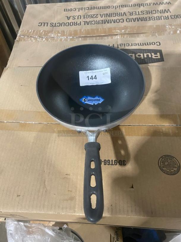 Vollrath 11" non-stick stir fry pan, model 68120, with Steel Coat x3 and black grip handle. New condition.