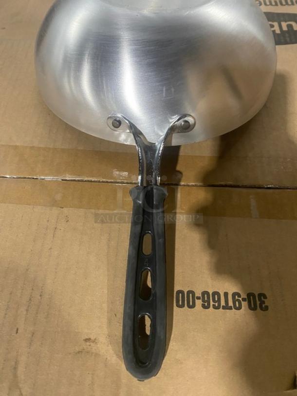 Vollrath 11" non-stick stir fry pan, model 68120, aluminum, steel coat x3, black grip handle, new condition.