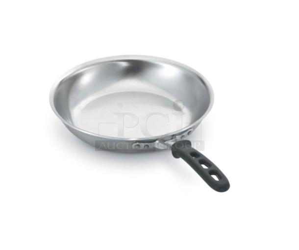 Brand new Vollrath Tribute Series 7" stainless steel fry pan, model 69807, with black grip handle, induction ready.