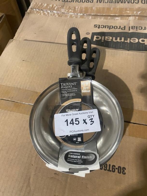 Brand new Vollrath Tribute Series 7" round stainless steel induction fry pan, model 69807, with black grip handle and tags.