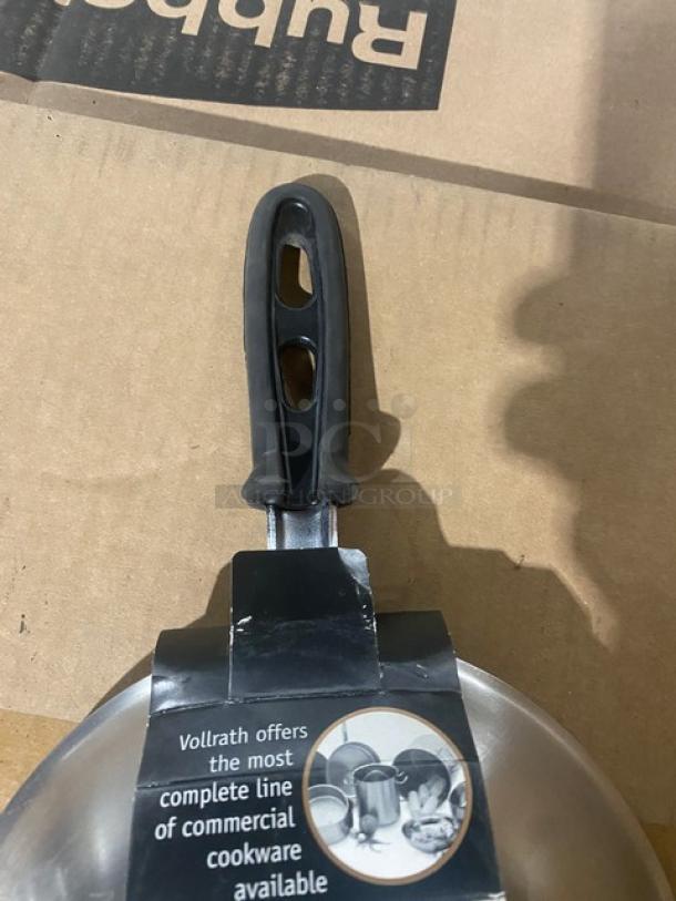 Brand new Vollrath Tribute Series 7" stainless steel induction-ready fry pan, model 69807, with black grip handle.