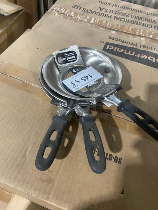 Brand new Vollrath Tribute Series 7" stainless steel fry pans, model 69807, induction ready, with black grip handles.