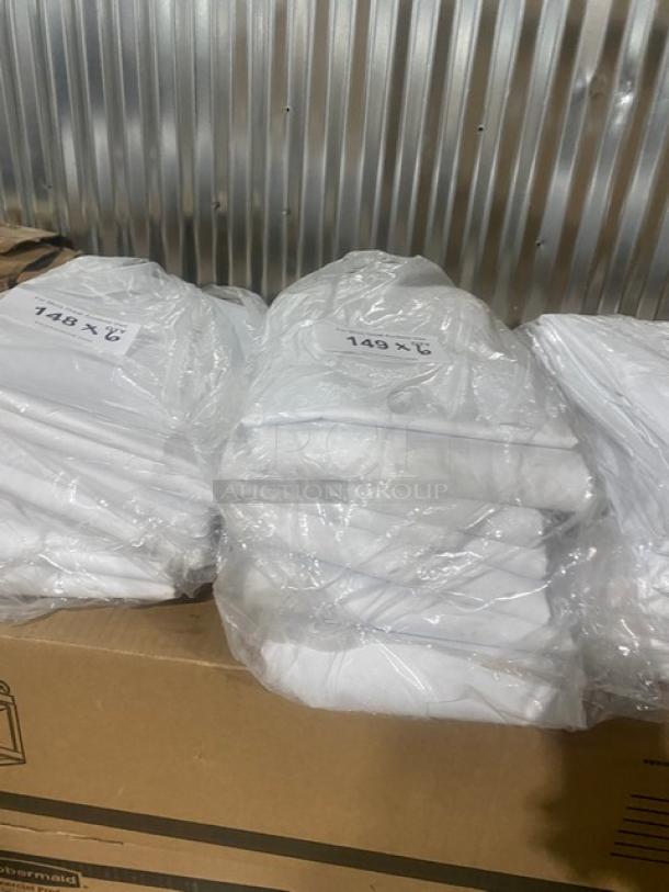 Brand new Thomaston Mills T180 white sheets, 50/50 cotton-poly blend, 108"x115", no iron percale, packaged in plastic.