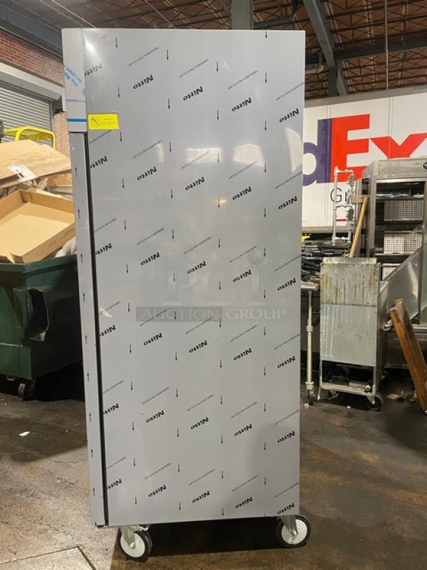 Beverage-Air TMF2HC-1S stainless steel 54" reach-in freezer, top-mounted, on casters, like new condition, protective wrap.