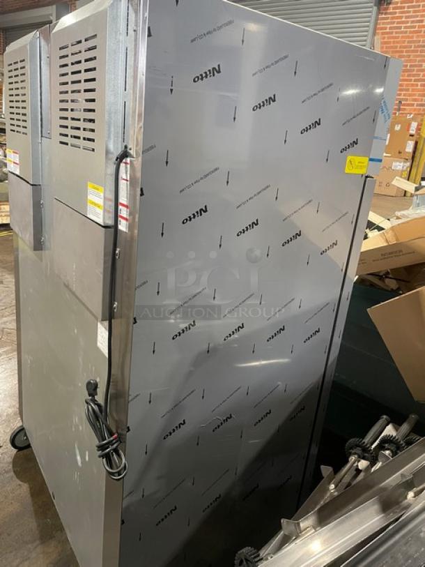 Beverage-Air TMF2HC1S 54" Stainless Steel 2-Door Top-Mount Freezer. Like new, on casters, with poly-coated wire racks.