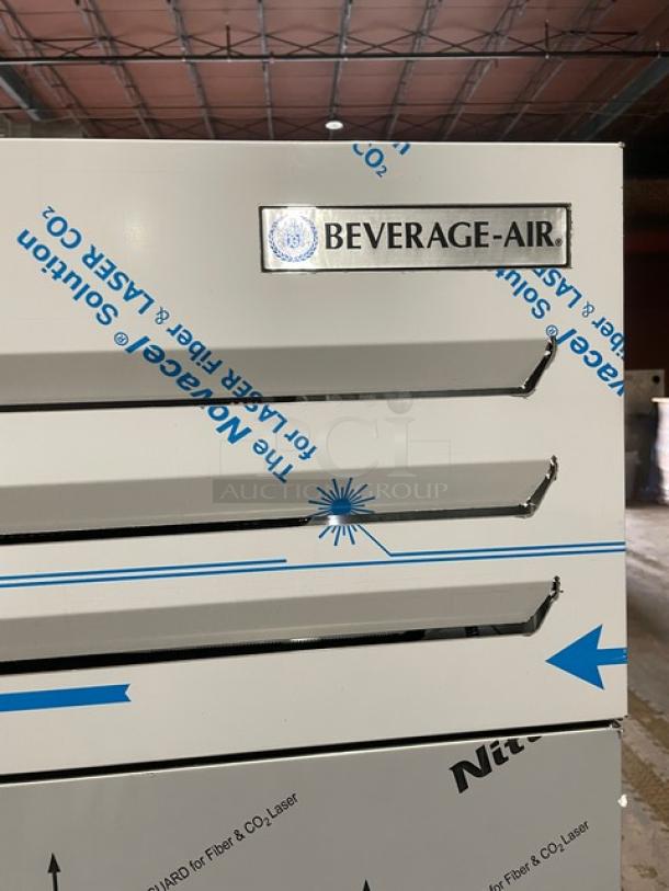 Beverage-Air stainless steel 2-door reach-in freezer, model TMF2HC1S, on casters, like new, with poly-coated rack.