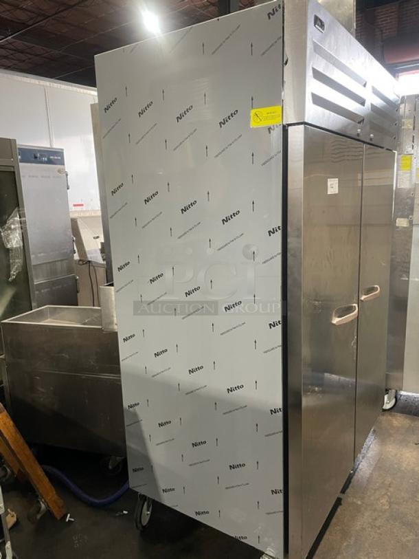Beverage-Air TMF2HC-1S commercial 2-door stainless steel freezer, 54" reach-in, top-mount, with casters and poly-coated rack, like new condition.