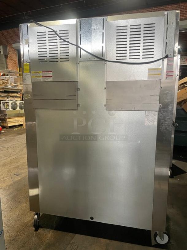 Beverage-Air TMF2HC-1S commercial stainless steel 2-door freezer, 54" width, top-mount, on casters, poly-coated rack, like new.