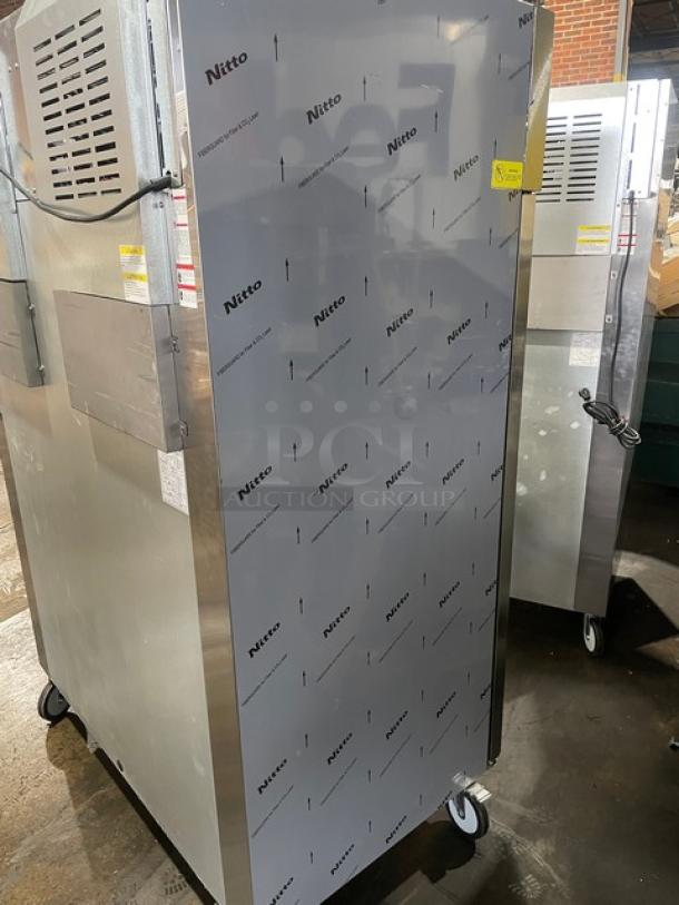 Beverage-Air TMF2HC-1S stainless steel 54" reach-in freezer, like new, on casters, with poly-coated wire rack. Model TMF2HC-1S.