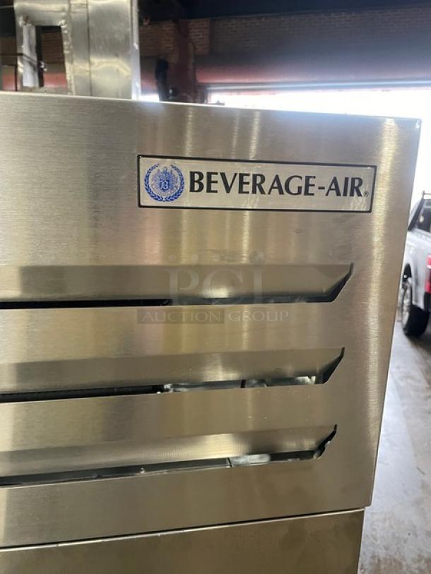 Beverage-Air TMF2HC-1S commercial stainless steel 2-door reach-in freezer with poly-coated rack, like new condition, on casters.
