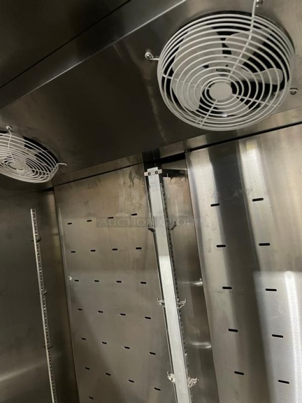 Beverage-Air model TMF2HC-1S stainless steel interior with fans, showing poly coated wire rack mounts, like new condition.