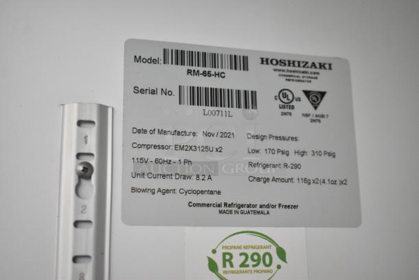 Hoshizaki RM-65-HC label showing model, serial number, 115V specs, R-290 refrigerant, and manufacturing details.