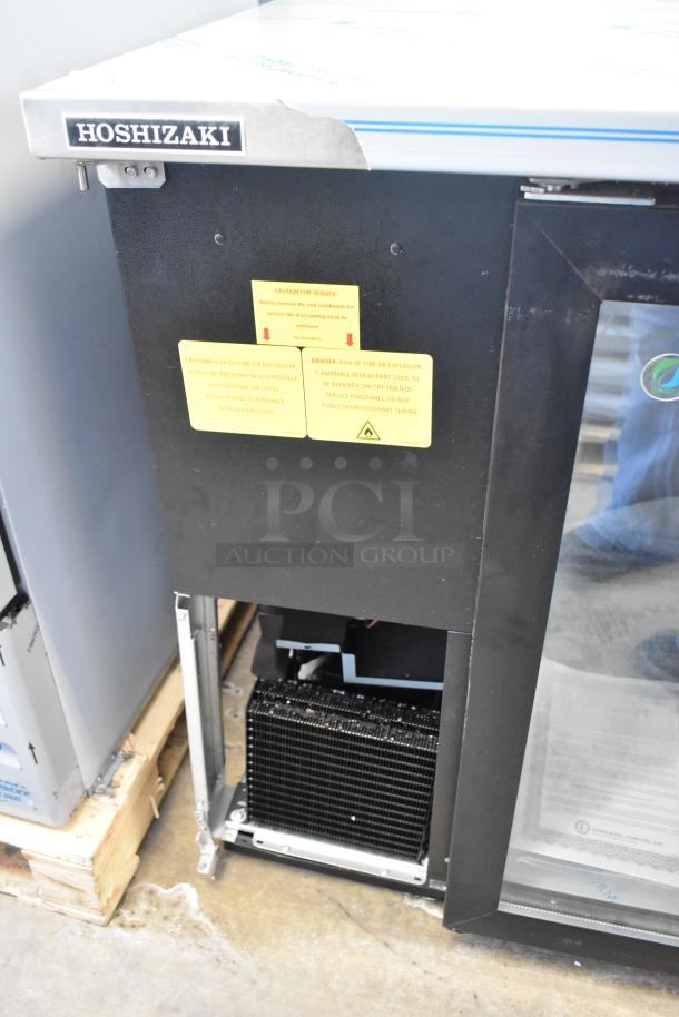 Brand new 2022 Hoshizaki BB95-G 3-door bar cooler, 115V, 1 Phase, tags showing caution and service instructions.