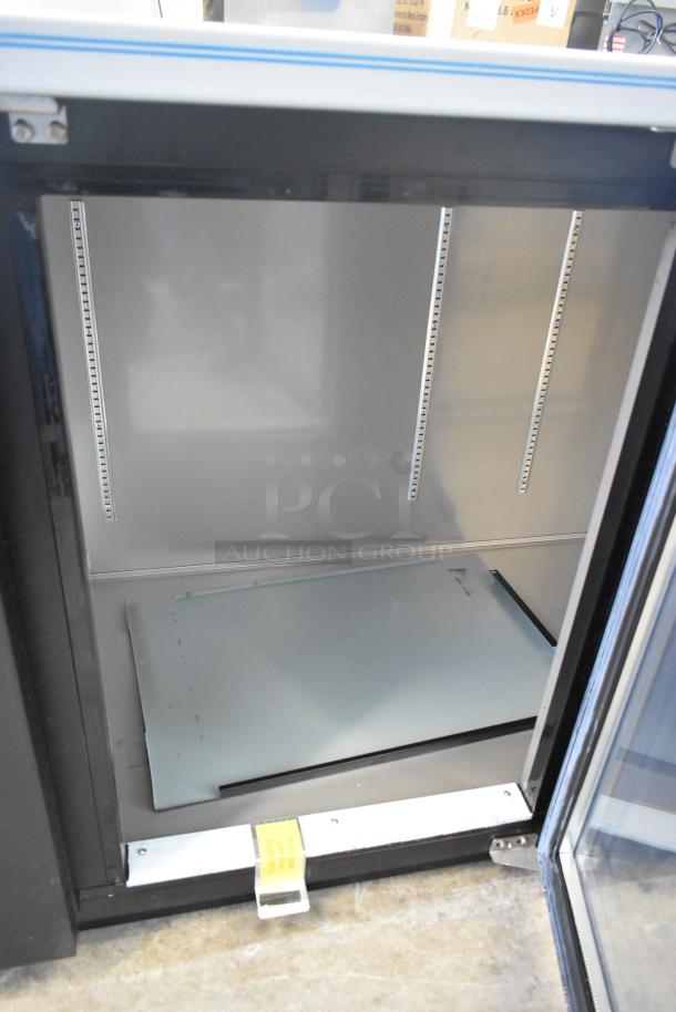 Brand new 2022 Hoshizaki BB95-G 3-door back bar cooler, 115 volts, one phase, shown with open door and shelving brackets.