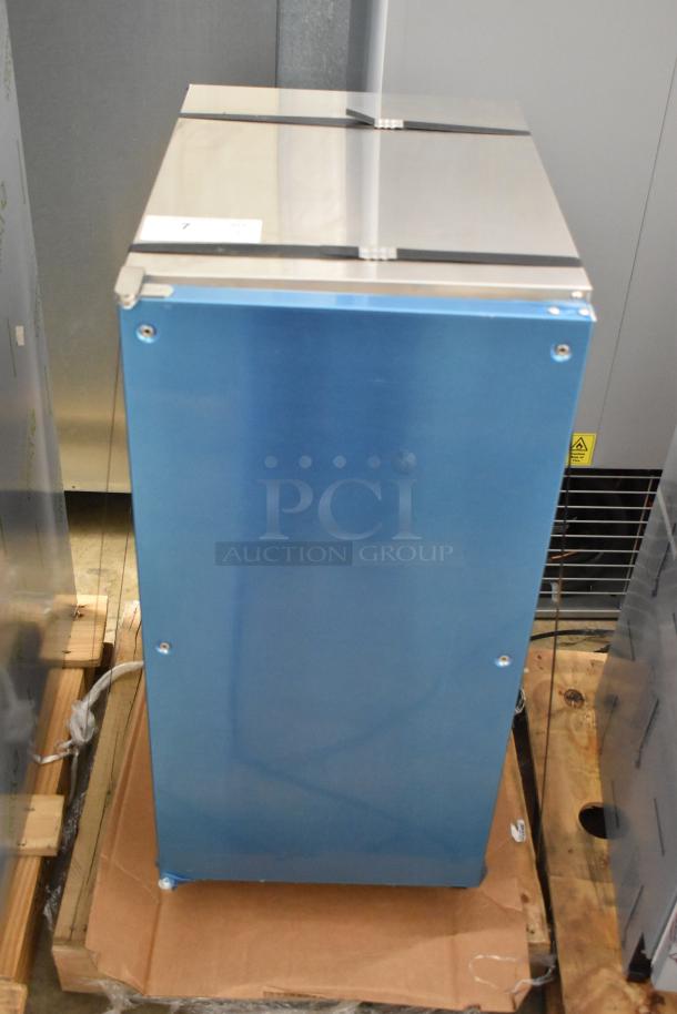 Brand new 2024 Hoshizaki AM-50BAJ-DS commercial icemaker, 115 volts, 1 phase, in protective blue wrap.