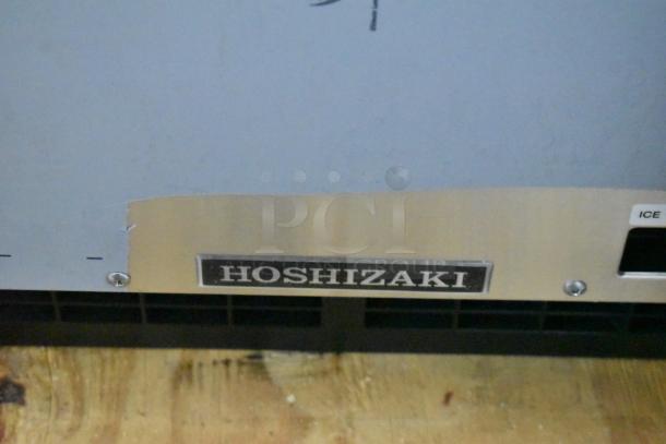 Brand new Hoshizaki AM-50BAJ-DS icemaker, top hat cuber, 115V, 1 phase, featuring Hoshizaki logo on front panel.