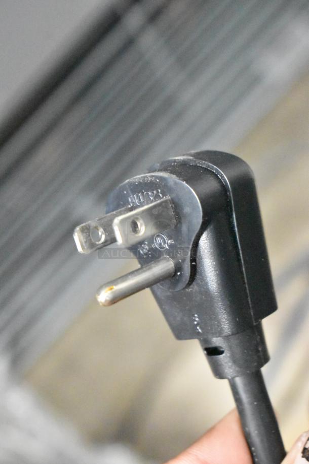 Close-up of a power plug for the Hoshizaki AM-50BAJ-DS icemaker, showing 115V, 1-phase compatibility.