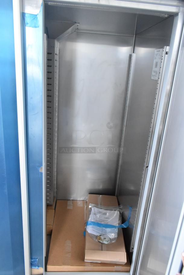 Brand new 2025 Hoshizaki F2A-FS commercial 2-door reach-in freezer, 115 volts, 1 phase, with shelves and manual included.