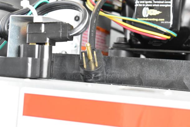 Electrical components and power plug of a brand new 2025 Hoshizaki F2A-FS commercial 2 door reach-in freezer.