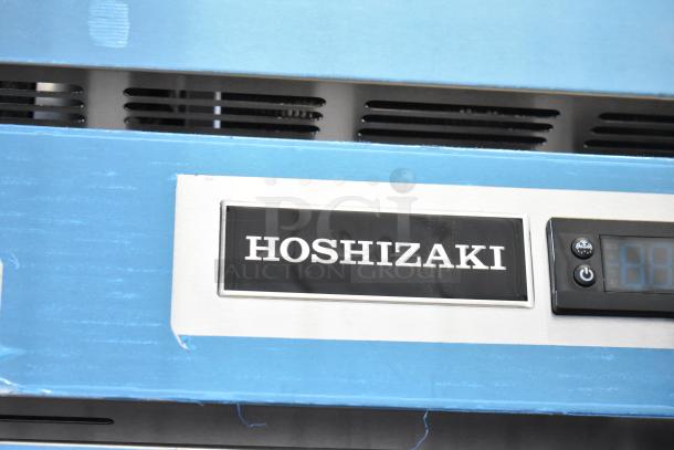 Brand new 2025 Hoshizaki F1A-FSL commercial reach-in freezer, 115V, 1 phase. Features control panel and Hoshizaki logo.