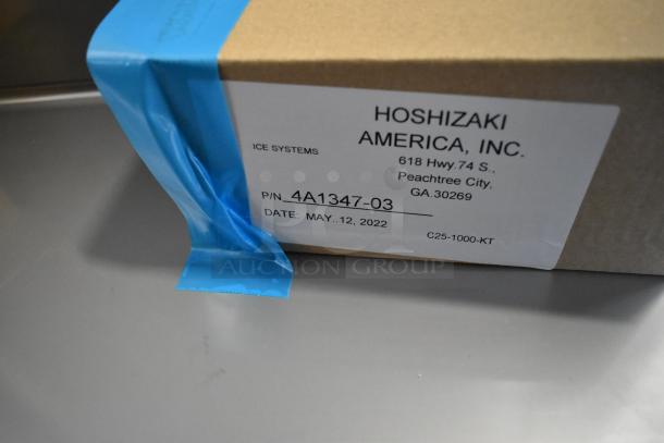 Brand new 2025 Hoshizaki F1A-FSL commercial freezer box with blue seal, part number 4A1347-03, dated May 12, 2022.