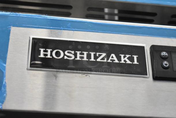 BRAND NEW Hoshizaki R2A-FSN Cooler, 2-door, 115V, 1-phase. Close-up of control panel and Hoshizaki logo.