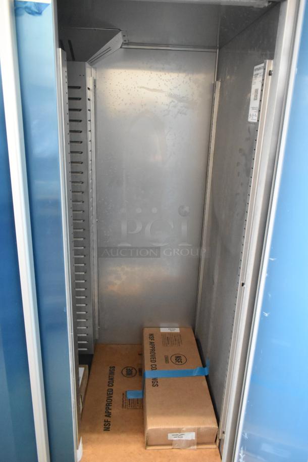 Brand new 2025 Hoshizaki R2A-FSN commercial 2-door reach-in cooler, 115V, 1-phase, empty interior, visible packaging.