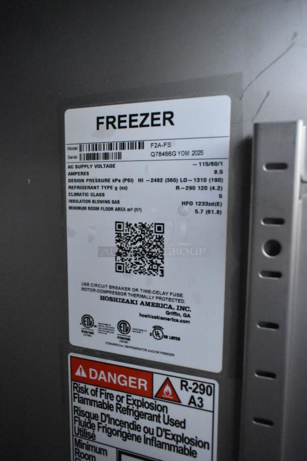 Brand new 2025 Hoshizaki F2A-FS commercial 2-door reach-in freezer label, 115 volts, 1 phase, energy specs shown.