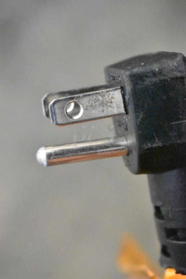 Close-up of a power plug for the Hoshizaki HR24C-G commercial cooler, showing a standard three-prong design.