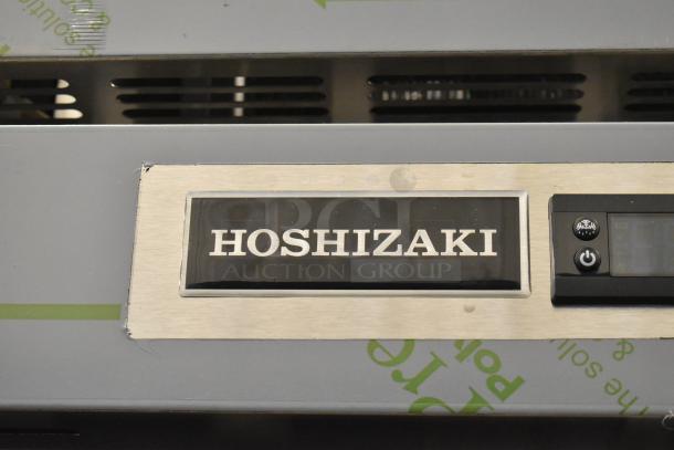 Brand new 2026 Hoshizaki F1A-FSL commercial freezer, single door, 115 volts, 1 phase. Visible Hoshizaki logo and controls.