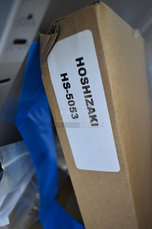 Alt text: "Hoshizaki HS-5053 box for 2025 R1A-FS cooler, brand new, 115V, 1 phase. Close-up of label and packaging."