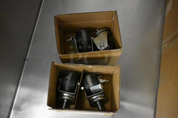 Boxes containing wheels and hardware for Hoshizaki R1A-FSL commercial cooler, indicating new condition.