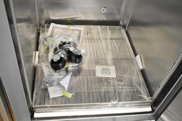 Brand new 2022 Hoshizaki EF1A-FS commercial single door reach-in freezer, 115V, with shelves wrapped and caster kit included.