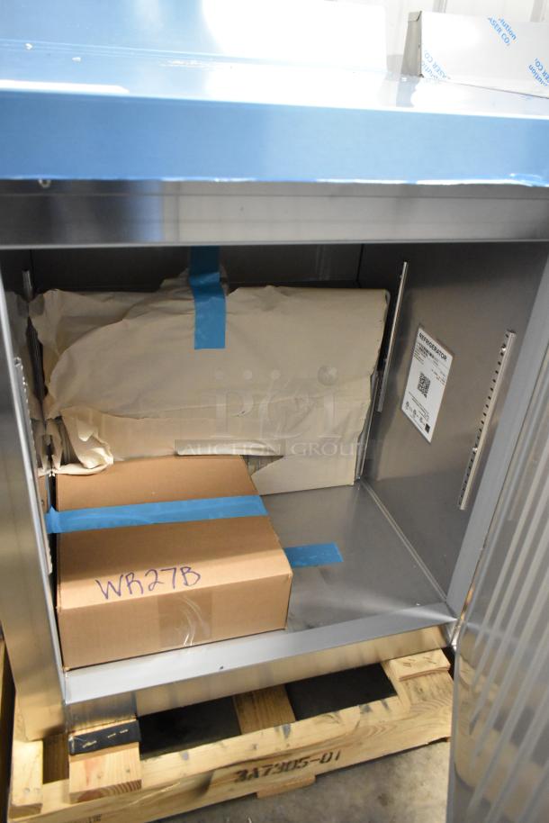 Brand new 2026 Hoshizaki WR27B commercial work top cooler, single door, 115V, 1 phase, on pallet, interior packaging visible.