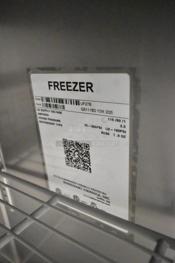 Brand new 2025 Hoshizaki UF27B commercial freezer with single door, 115 volts, 1 phase. Model and serial tags visible.