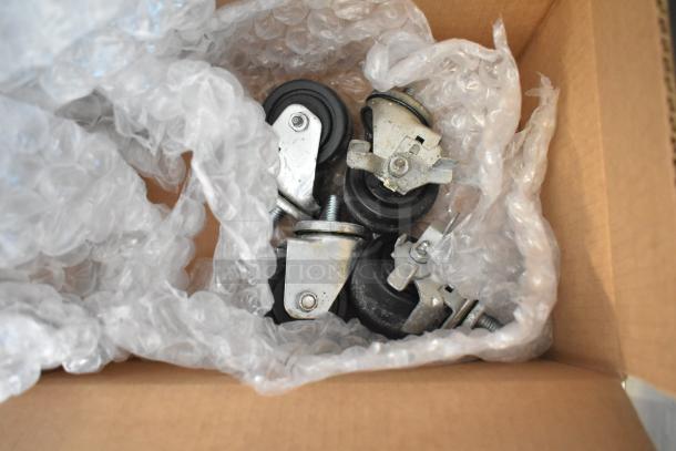 New Hoshizaki F1A-FSL freezer commercial casters in packaging.