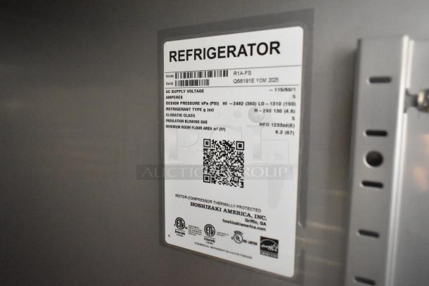 Brand new 2025 Hoshizaki R1A-FS Reach In Cooler, single door, 115V, 1 phase, label showing model and specs.