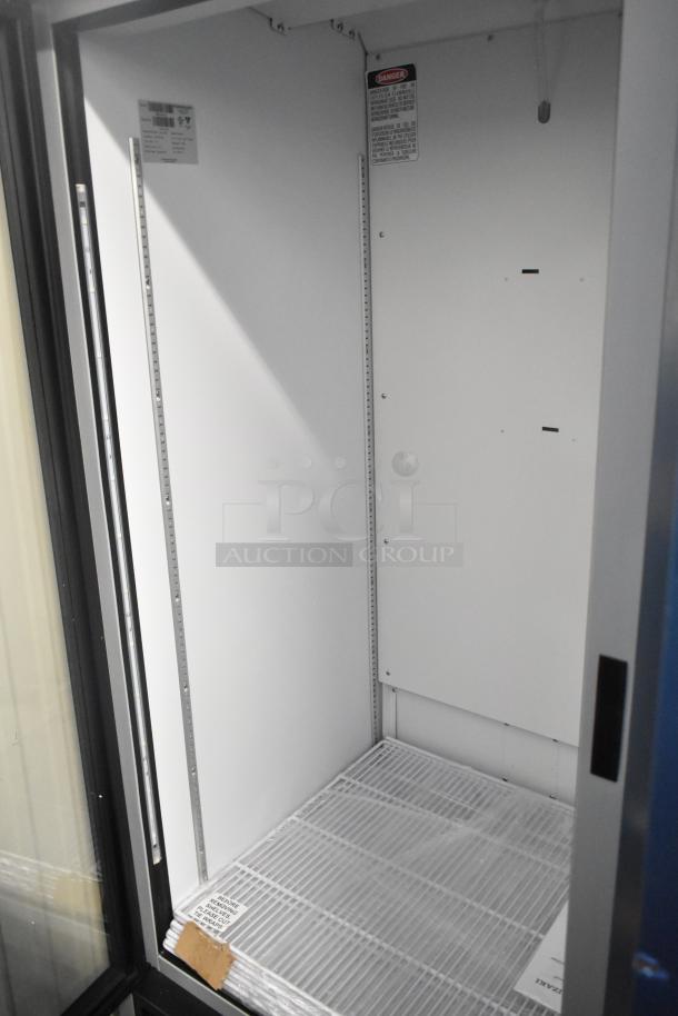 Brand new 2025 Hoshizaki RM-26-HC-L commercial single door cooler, 115V, 1 phase, with interior shelving and safety labels.