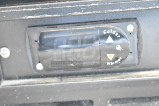 2019 Habco SE18 Reach-In Cooler control panel with temperature adjustment buttons labeled "Colder" and "Warmer."