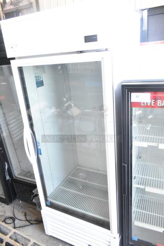 2020 True TSCI-600R-G-PH single door cooler merchandiser, glass front, 115V, 1 phase, excellent condition.