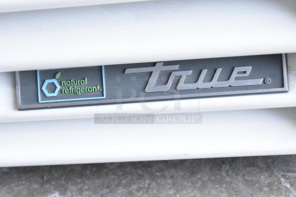 2020 True TSCI-600R-G-PH cooler logo showing "True" branding and "natural refrigerant" label.