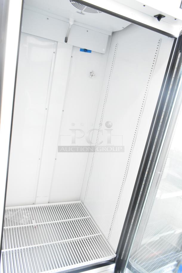 2020 True TSCI-600R-G-PH single door cooler merchandiser. Excellent condition, spacious interior, adjustable shelving.