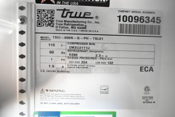 Label showing True TSCI-600R-G-PH cooler specs: 115V, 60Hz, R290 refrigerant, 1 phase, serial 10096345.