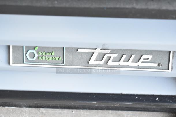 2017 True GDM-12-HC-LD cooler logo with "natural refrigerant" text, showcasing eco-friendly feature.