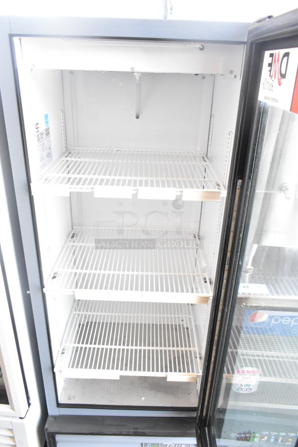 2017 True GDM-12-HC-LD commercial single door cooler, clean interior, 3 shelves, 115V, good condition, model label visible.