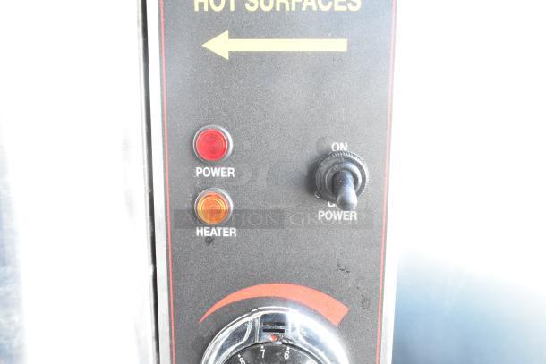 Cecilware ME15EN Commercial Water Heater control panel, showing power and heater lights, toggle switch, and temperature dial.