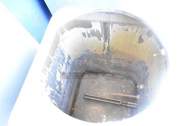 Cecilware ME15EN commercial water heater interior view, showing wear and mineral buildup, 120 volts, 1 phase.