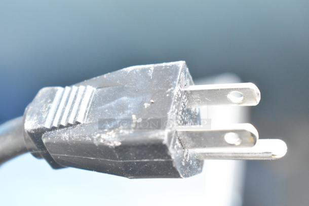 Cecilware ME15EN Commercial Water Heater plug, 120 volts, 1 phase, black, standard three-prong, close-up view.