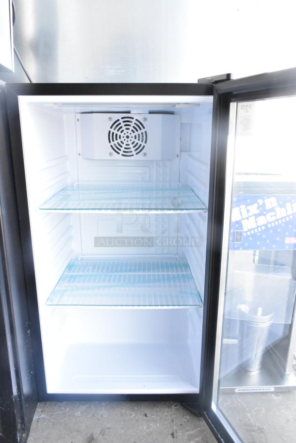 SC98 Commercial Single Door Mini Cooler Merchandiser, Model SC98, 115 Volts, 1 Phase, includes two glass shelves, new condition.