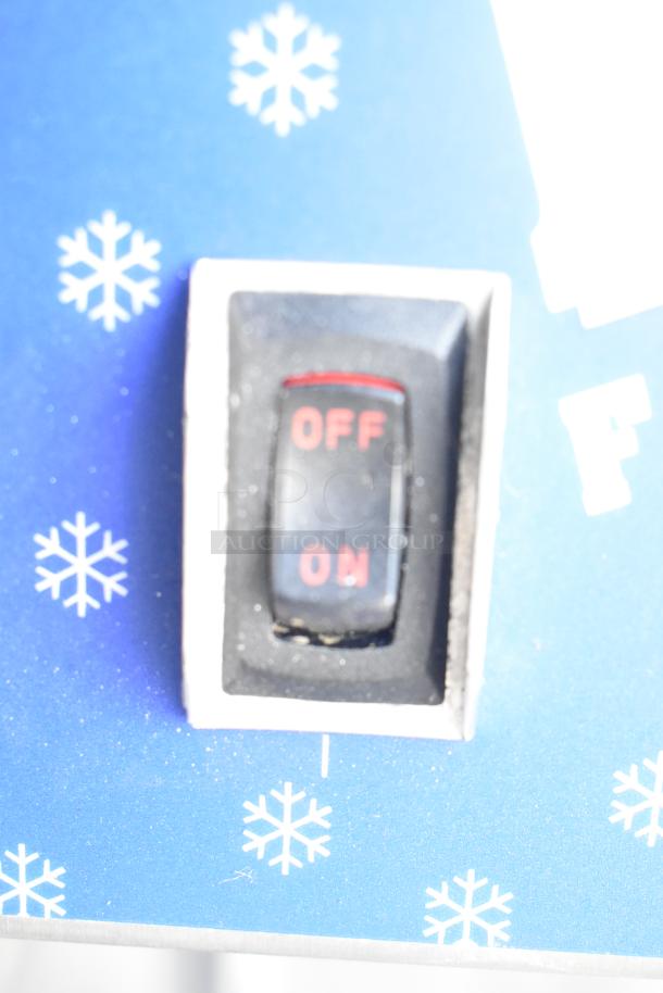 Vita-Mix VM0800A frozen drink mixer control panel with an on/off switch on a snowflake-patterned background.